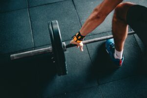 HYROX athlete training with sled push and endurance conditioning