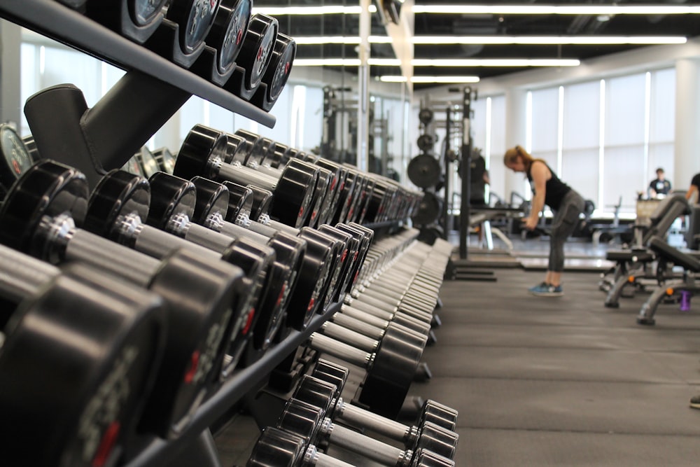 Athlete performing sled push during HYROX workout station